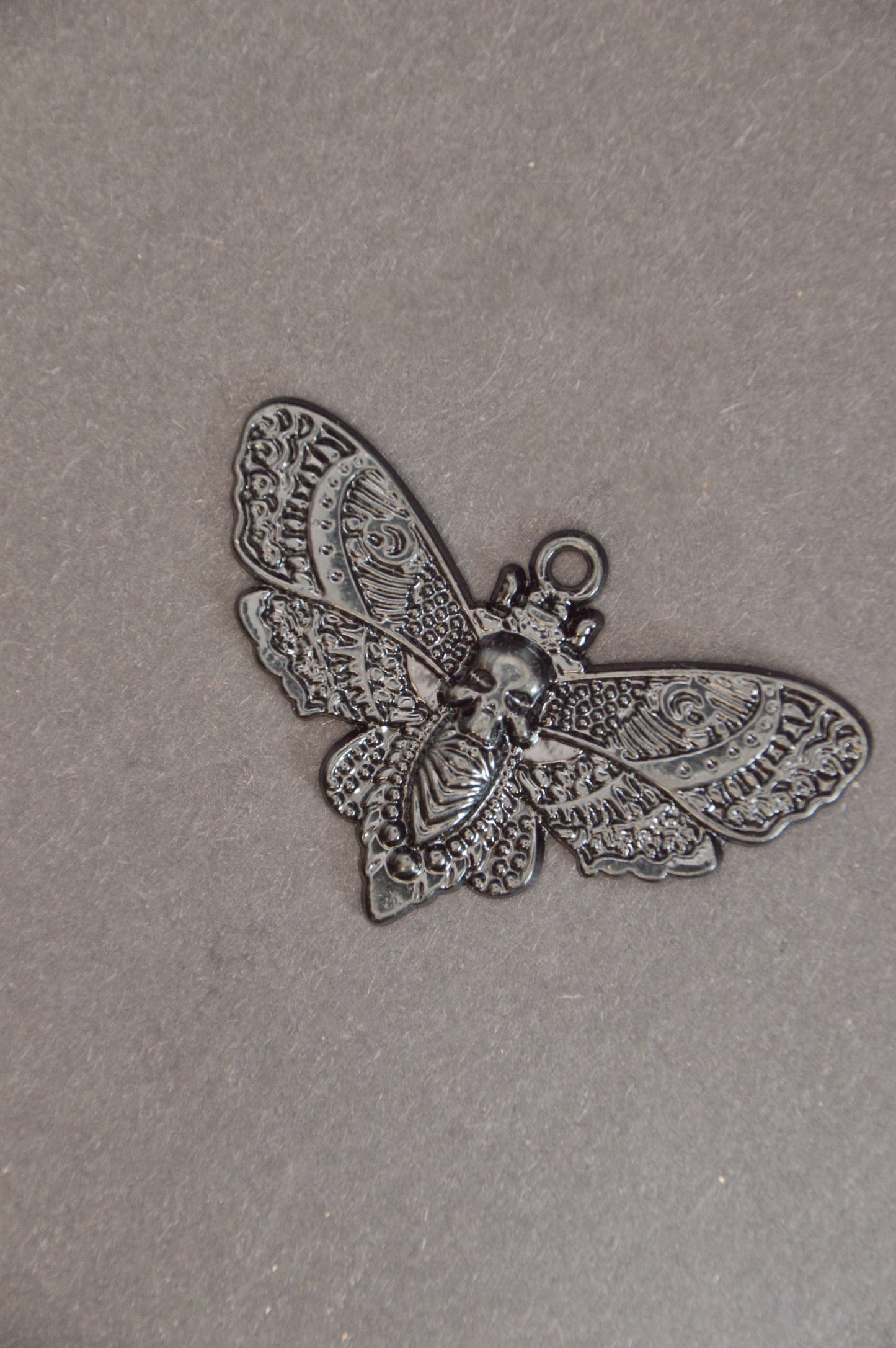 Death Moth Charms