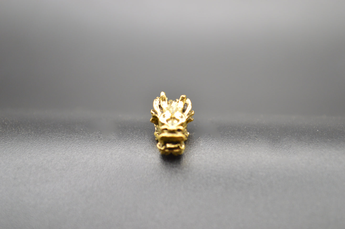Dragonhead Charms